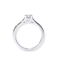 The Elegant Tapered Band Lab Diamond Engagement Ring showcases a single round lab diamond solitaire in a prong setting on minimalist white gold—an elegant choice for women’s engagement rings.