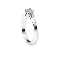 The Elegant Tapered Band Lab Diamond Engagement Ring features a single round lab diamond solitaire in a classic four-prong setting, beautifully displayed on a white background.