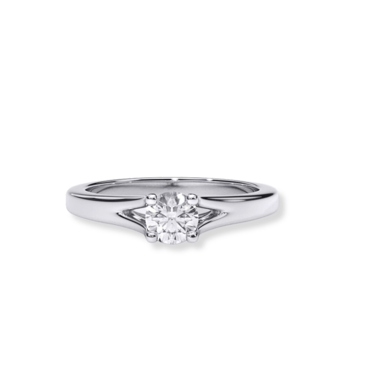 The Elegant Tapered Band Lab Diamond Engagement Ring is a silver women's ring with a single round-cut lab diamond solitaire set in a polished, sleek band, shown against a white background.