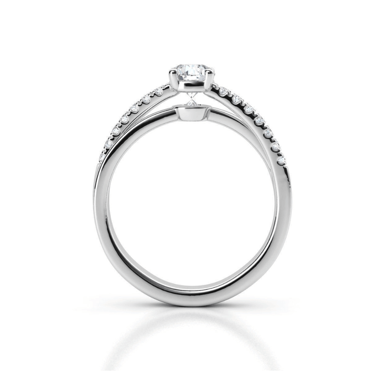 The Elegant Twist Solitaire Engagement Ring in white gold showcases a round lab-grown diamond in a prong setting, with small diamonds lining the upper half of the band, displayed upright against a white background.