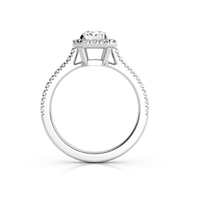 Side view of the Emerald-Cut Halo Lab Diamond Engagement Ring featuring a large emerald-cut center stone with prongs and sparkling lab diamonds set along the pavé band.