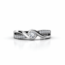  alt=" Celebrate love with the Engagement Twist Ring featuring a lab-grown diamond. Elegant design, eco-friendly brilliance, and timeless sophistication. "