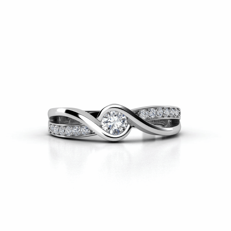 The Engagement Twist Ring - Lab Diamond is a silver ring with a twisted band, featuring a round lab-grown diamond at the center and smaller diamonds along the elegant setting.