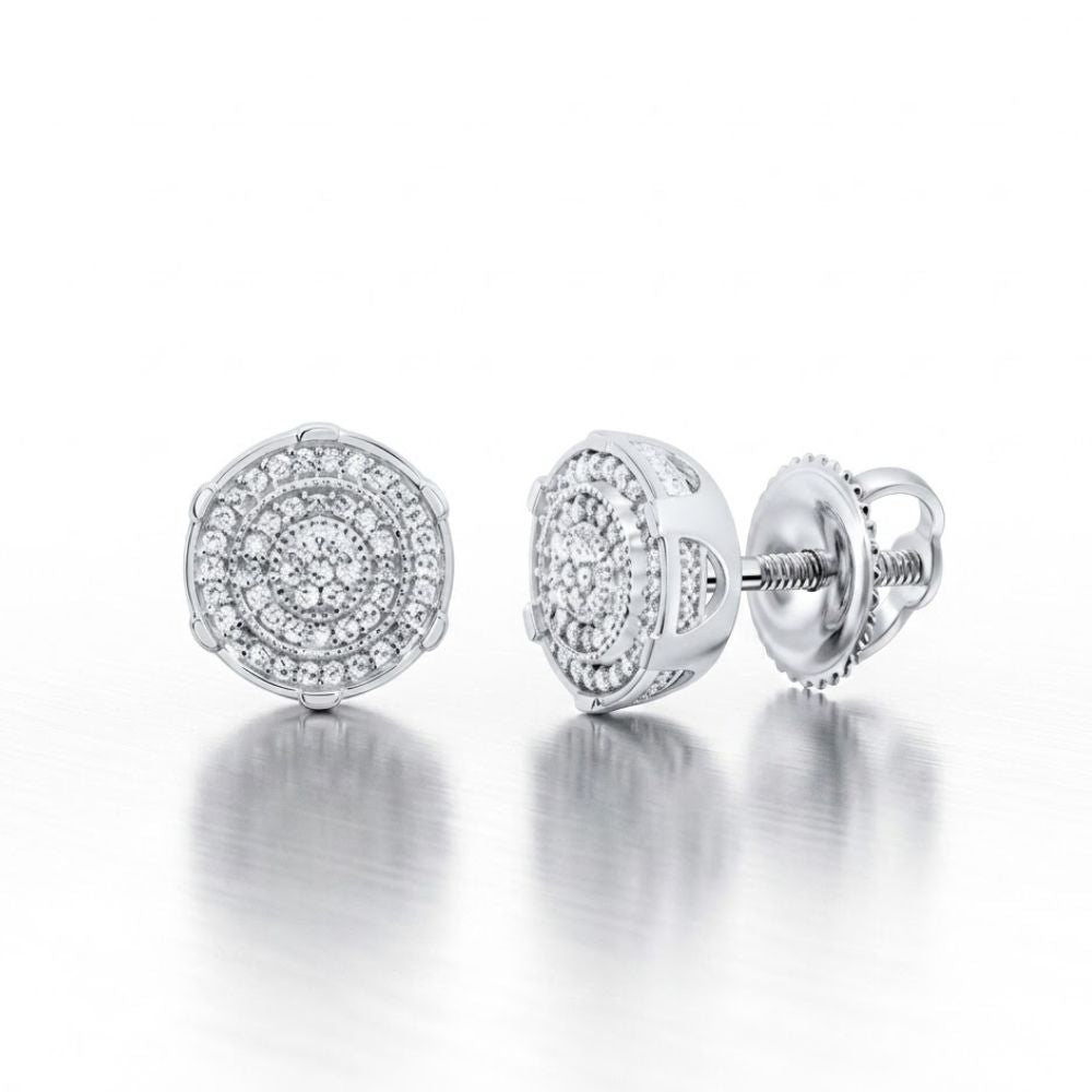 A pair of 1/4CTW Diamond Men’s Earrings in sterling silver, featuring multiple small diamonds set in concentric circles, displayed on a reflective white surface.