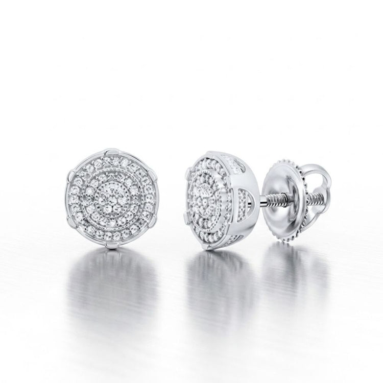 A pair of 1/4CTW Diamond Men’s Earrings in sterling silver, featuring multiple small diamonds set in concentric circles, displayed on a reflective white surface.