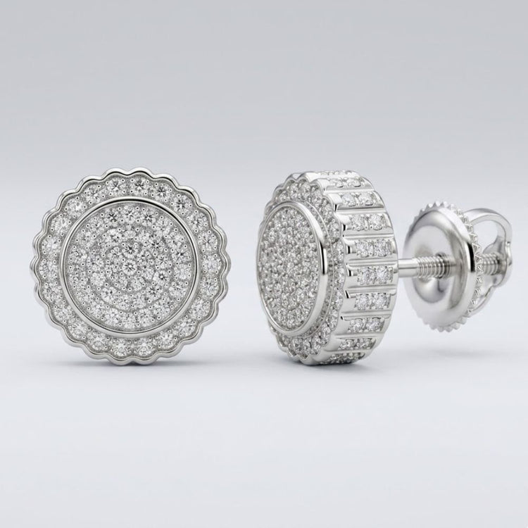 The 1/5CTW Diamond Round Earrings Sterling Silver Gift features multiple rows of sparkling round diamonds in sterling silver with scalloped edges and screw-back closures, displayed on a plain light gray background.