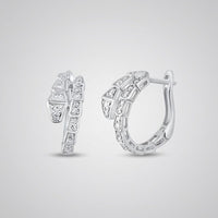 The 14k White Gold Snake Diamond Hoop Earrings 1/3CTW showcase geometric segments with sparkling natural diamonds, set in hoops displayed on a plain light gray background.