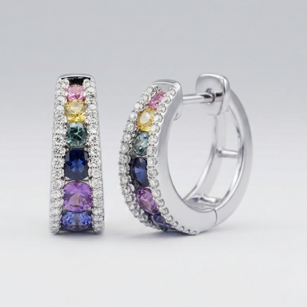14k White Gold Multi Color Sapphire Hoop Earrings, adorned with natural diamonds and vibrant yellow, pink, blue, and purple gemstones, elegantly displayed against a plain light background.