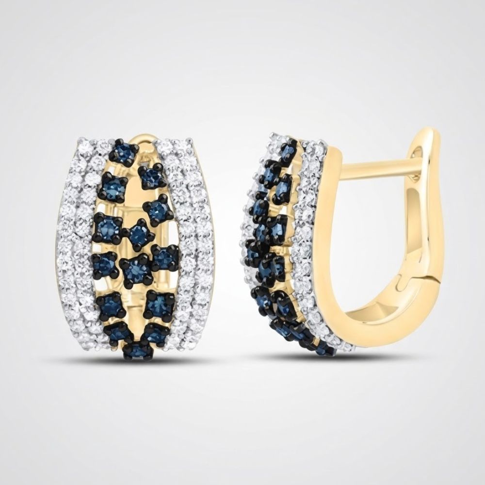 The 10k Yellow Gold Blue Diamond Hoop Earrings 1/2CTW showcase blue and white diamonds in a decorative pattern, adding elegance and sparkle to any look.