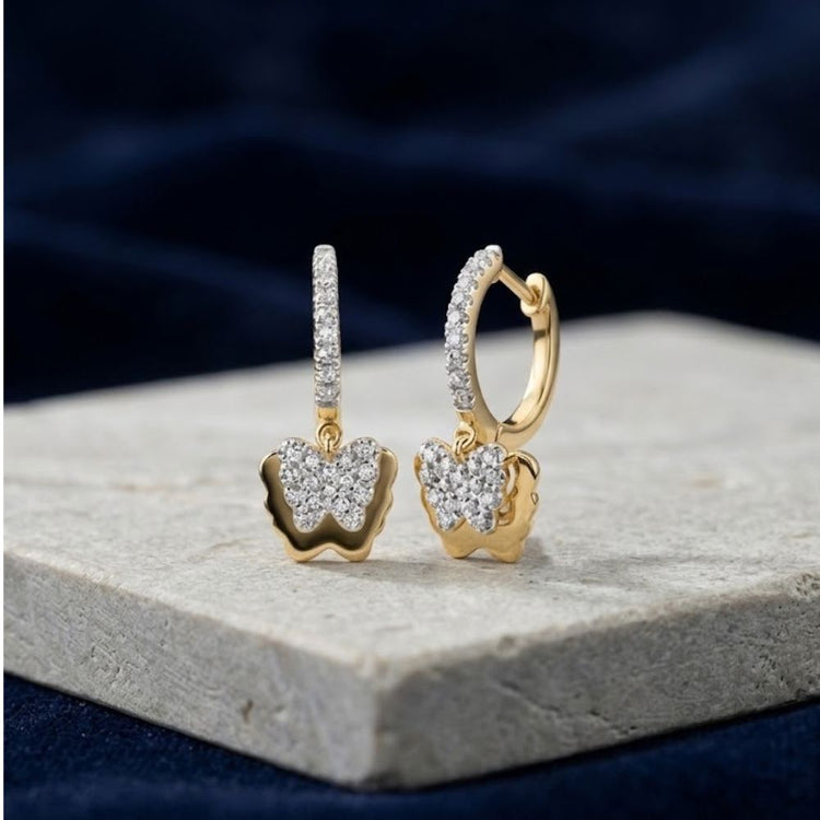 10k Gold Diamond Butterfly Hoop Earrings 1/4 Cttw featuring diamond-encrusted butterfly dangle charms.