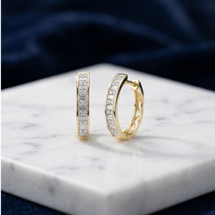 1/2CTW Diamond Baguette Hoop Earrings 14K Gold featuring a row of baguette diamonds set in a hoop design.