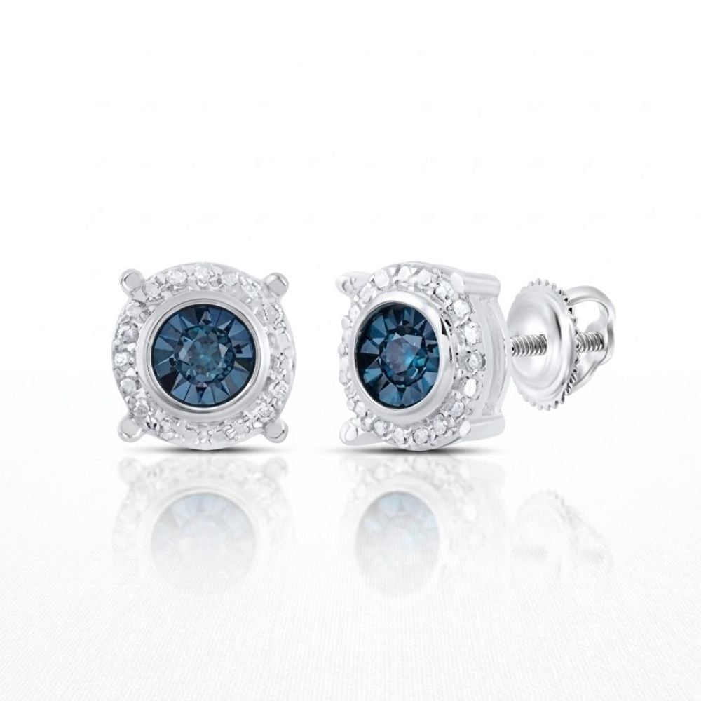 Blue Diamond Stud Earrings Sterling Silver 1/10 Cttw shown on a white background, featuring round blue gemstones at the center and a halo of small clear stones, with their reflection beneath.