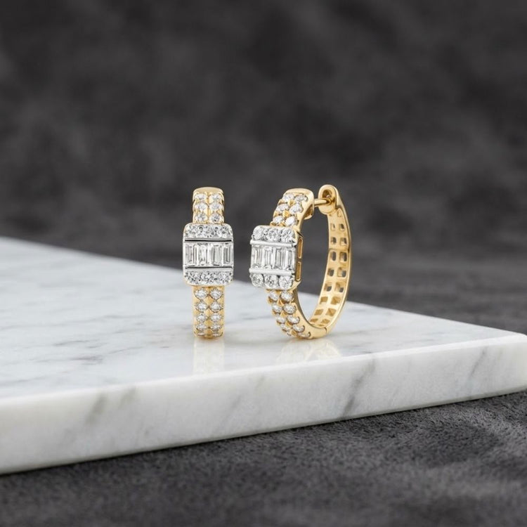 3/4CTW Natural Diamond Hoop Earrings 14K Gold hoops set with small round diamonds and a central row of baguette diamonds.