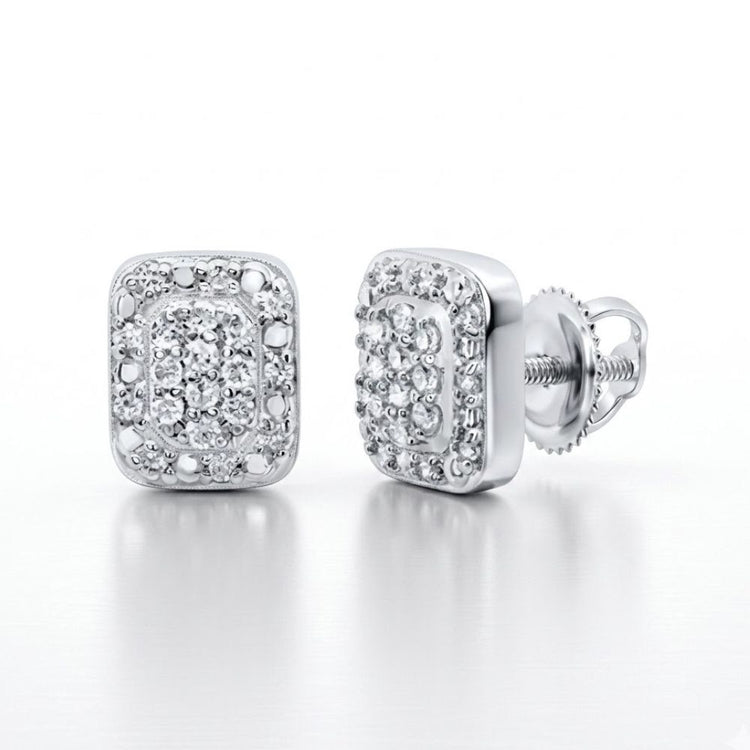Add a touch of elegance to your collection with these 1/8CTW Diamond Emerald Earrings, crafted in sterling silver and featuring sparkling diamonds. Square-shaped with screw-back closures, they’re displayed on a white background.