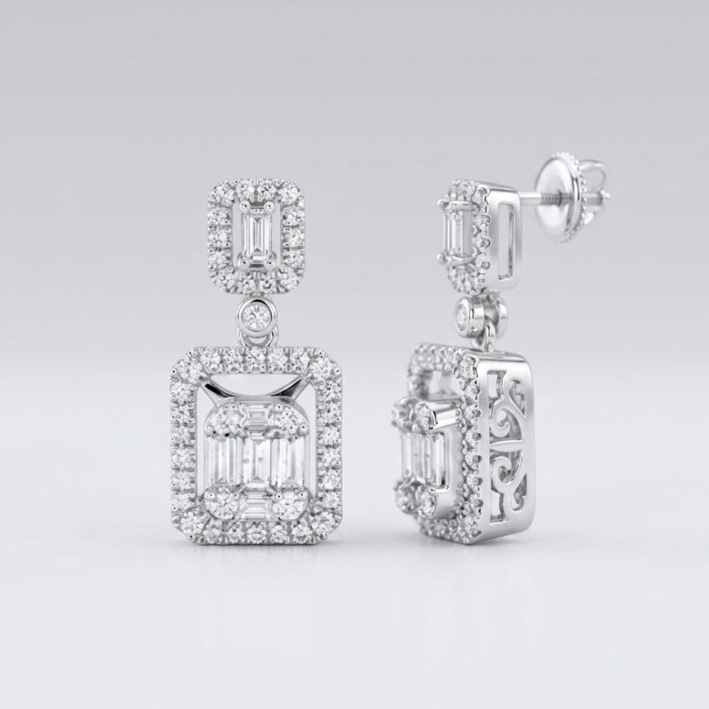 14k White Gold Baguette Diamond Dangle Earrings 1 Cttw featuring rectangular and square settings with sparkling diamonds and detailed sides, elegantly showcased against a plain, light background.