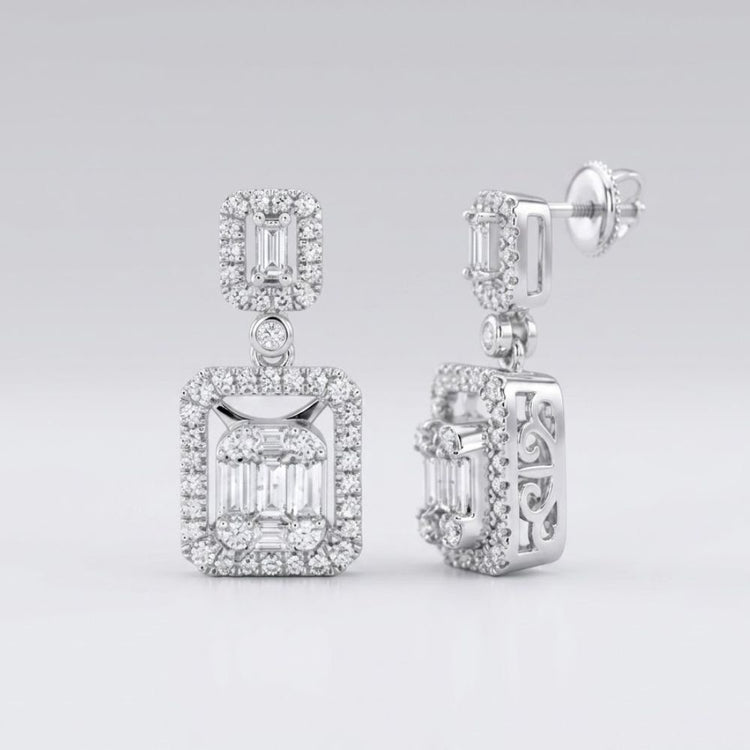 14k White Gold Baguette Diamond Dangle Earrings 1 Cttw featuring rectangular and square settings with sparkling diamonds and detailed sides, elegantly showcased against a plain, light background.