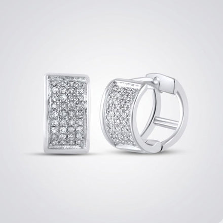 Sterling Silver Diamond Huggie Hoop Earrings 1/6 CTTW featuring a rectangular front with multiple sparkling diamonds, shown on a plain light grey background.