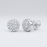 1/10CTW Diamond Round Earrings in sterling silver, featuring a double halo of sparkling diamonds, are displayed against a plain light gray background—an elegant gift choice.