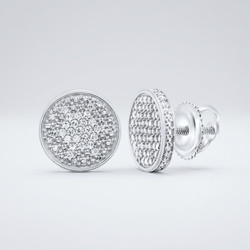 A pair of 1/4CTW natural diamond men's sterling silver earrings with pave-set sparkling white stones, displayed on a plain light gray background. One earring shows the front; the other reveals the side and screw-back closure.