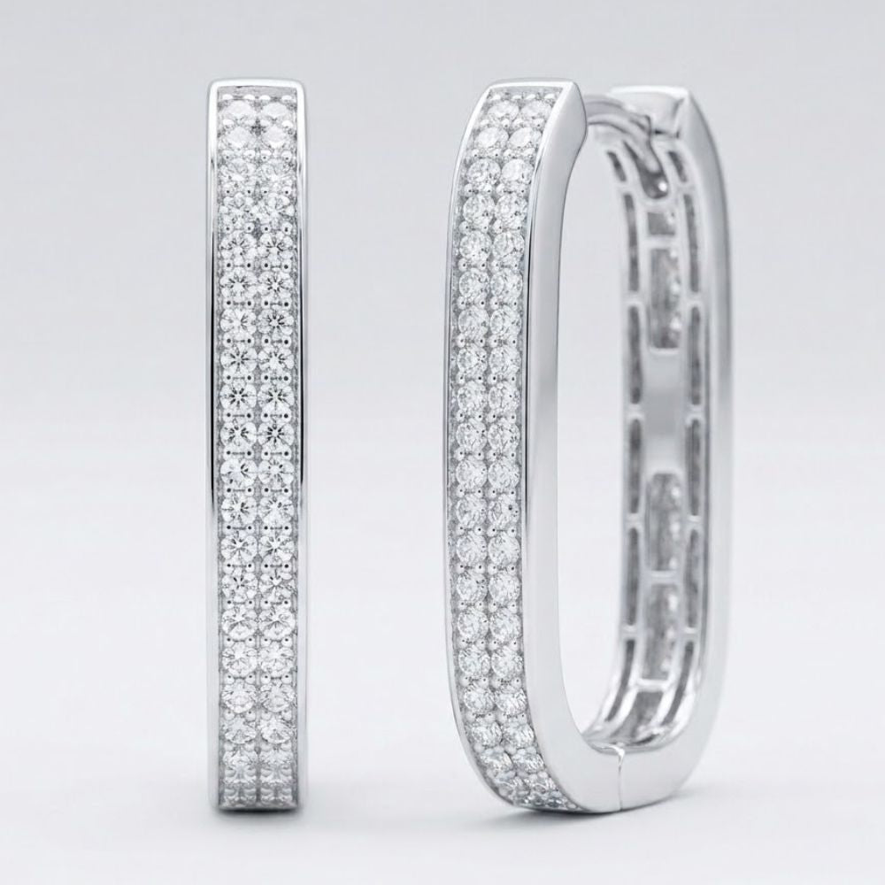 The 14k White Gold Diamond Hoop Earrings 3/8CTW feature three rows of sparkling natural diamonds in a rectangular design, displayed upright on a plain light gray background—a stunning piece of fine jewelry.