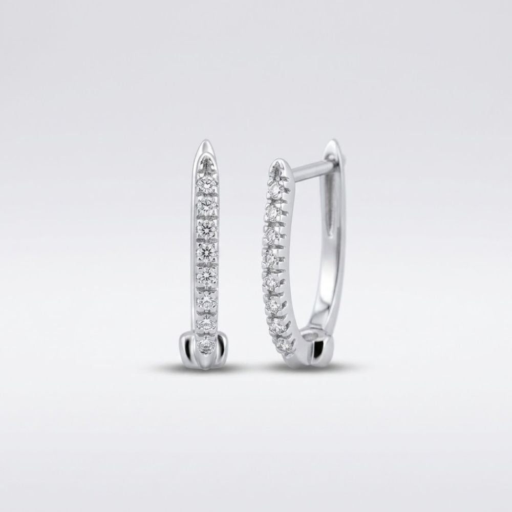 A pair of 10k Gold Round Diamond Hoop Earrings (1/12 Cttw) with slim silver hoops and sparkling diamonds along the front, shown on a plain light gray background.