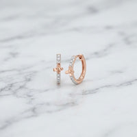 1/12CTW Natural Diamond Butterfly Hoop Earrings in 10k gold, each featuring a small accent and a row of embedded natural diamonds.