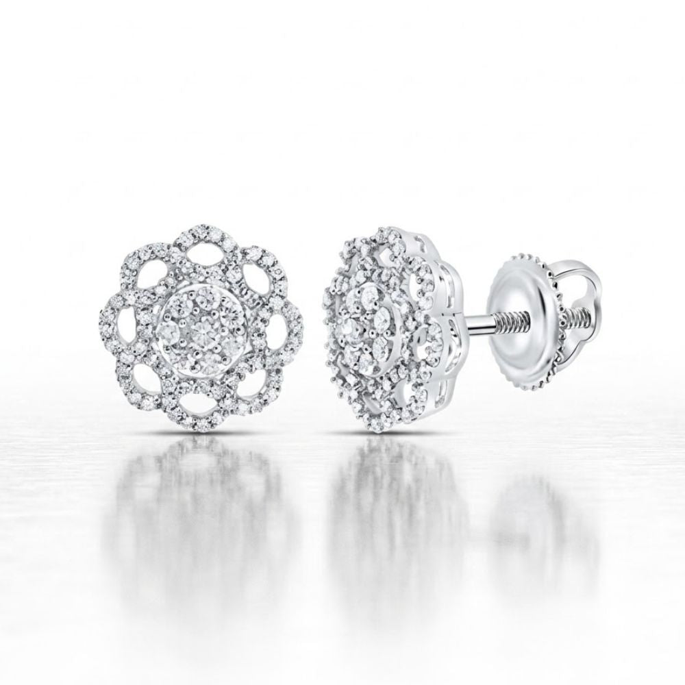 The 5/8CTW Natural Diamond Flower Earrings in sterling silver feature intricate petal designs, a central cluster of diamonds, and secure screw-back closures—a stunning piece of fine jewelry displayed on a white surface.