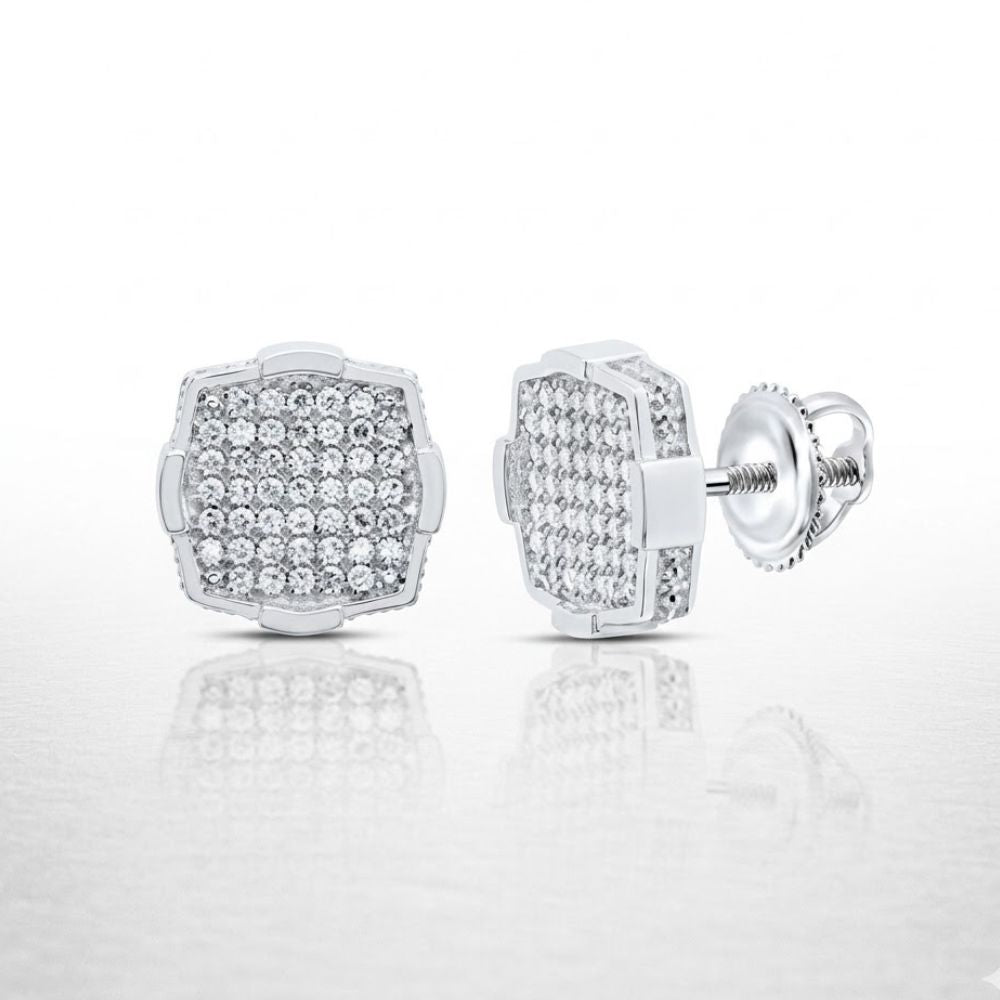 The 1/3CTW Diamond Cushion Men’s Earring in sterling silver features cushion-cut natural diamonds and a secure screw-back closure, elegantly displayed on a reflective white surface.