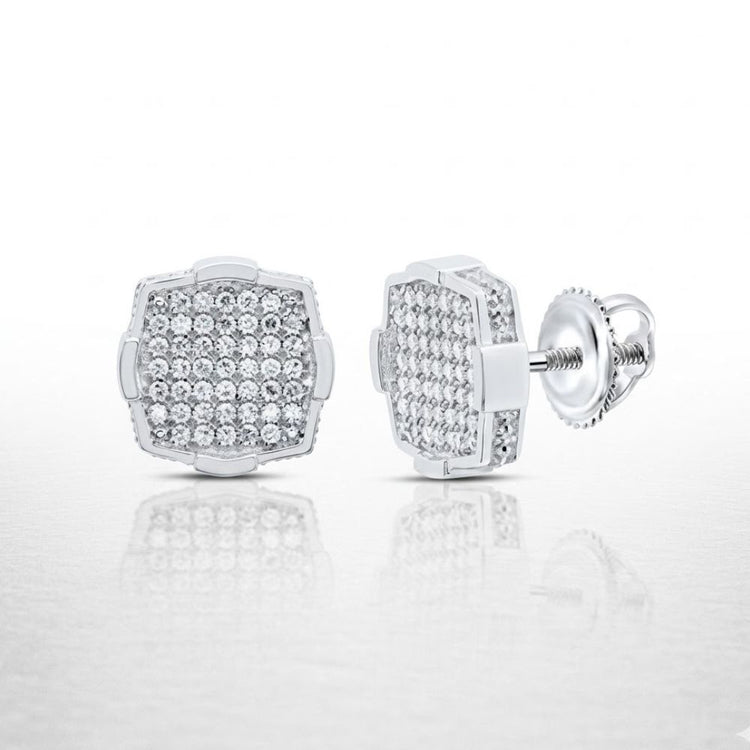 The 1/3CTW Diamond Cushion Men’s Earring in sterling silver features cushion-cut natural diamonds and a secure screw-back closure, elegantly displayed on a reflective white surface.