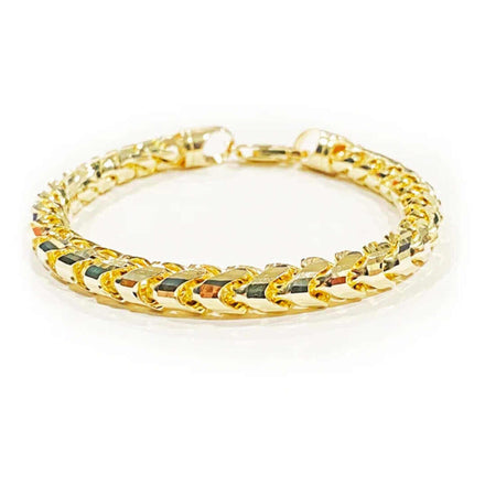 The Yellow Gold Franco Bracelet - 2.2mm features interlocking polished links and a shiny finish, reflecting exceptional Italian craftsmanship, shown on a plain white background.