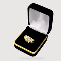 The Gold Nugget Ring - 10k Solid Gold features a textured design and is shown in an open black velvet box with a white satin interior and gold trim, set against a plain light background.