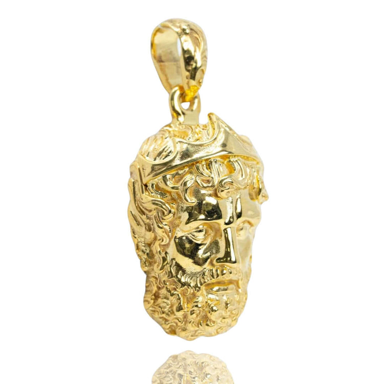 The Greek Poseidon Pendant is a 14K gold men’s pendant, expertly crafted in the shape of Poseidon's head with a crown and detailed features—a striking piece inspired by Greek mythology.