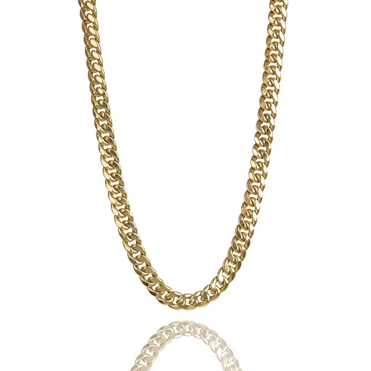 The Hollow Gold Cuban Link Chain 7.5mm - 15mm is shown against a white background, highlighting its thick, interlocking links and casting a subtle reflection beneath the lightweight chain.
