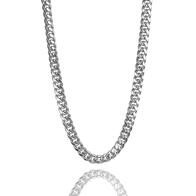 The Hollow White Gold Cuban Link Chain 3mm - 7mm is displayed against a white background, featuring a subtle reflection of the chain below.