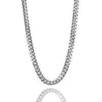 The Hollow White Gold Cuban Link Chain 3mm - 7mm is displayed against a white background, featuring a subtle reflection of the chain below.