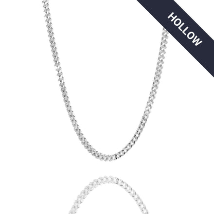 The Franco Chain (2mm-5.5mm) Hollow White Gold is shown against a white background. Its polished finish and reflection evoke real white gold. A dark diagonal banner at the top right displays "HOLLOW" in white text.