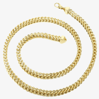 The Franco Chain - 2mm-7mm Hollow Yellow Gold is displayed spiraled on a white background, showcasing its woven Franco design, secure clasp, and rich detailed texture.