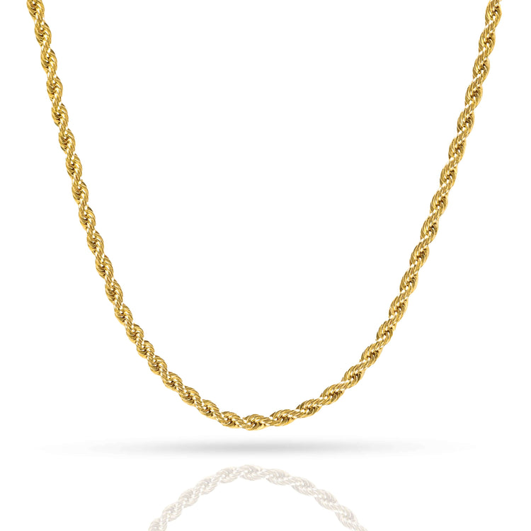 The Rope Chain - 2mm-5mm Hollow Yellow Gold necklace is displayed on a white background, highlighting its intricate twisted design and casting a soft reflection below.