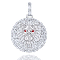 The Silver Ice Out Lion Head Charm Pendant features a round 925 sterling silver design with moissanite stones, a raised lion face, red gemstone eyes, and a diamond-covered bail for bold elegance.