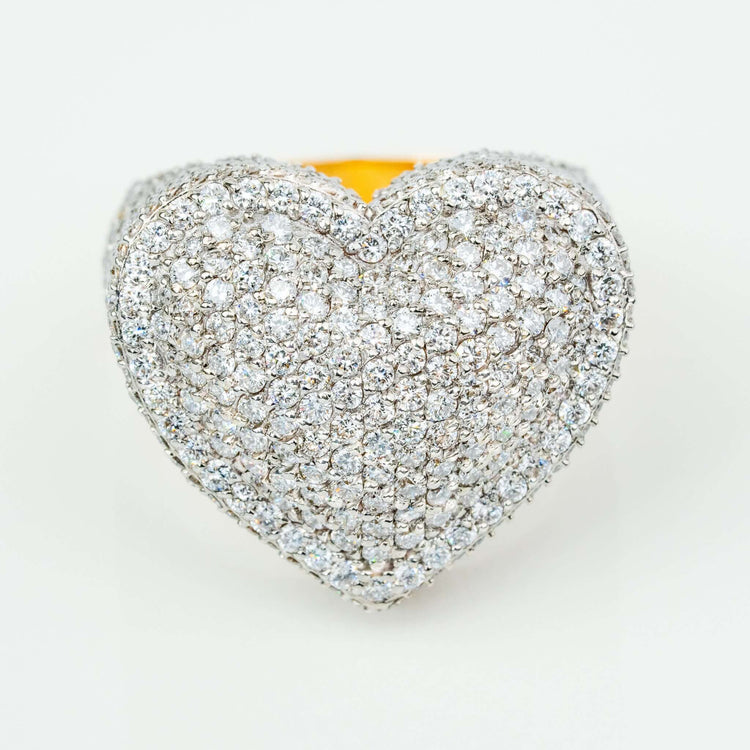 The Iced-Out Heart Cluster Ring 5.46 CT Diamond - 14k Yellow Gold features a dazzling heart-shaped cluster of white diamonds, displayed on a clean, white background.
