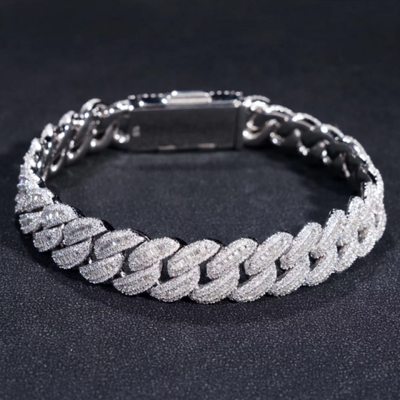 Product Image of 12mm Iced-out silver Cuban Link bracelet with certified baguette moissanite center stones. 925 sterling silver and rhodium plated, stamped for authenticity. | GOLDZENN 