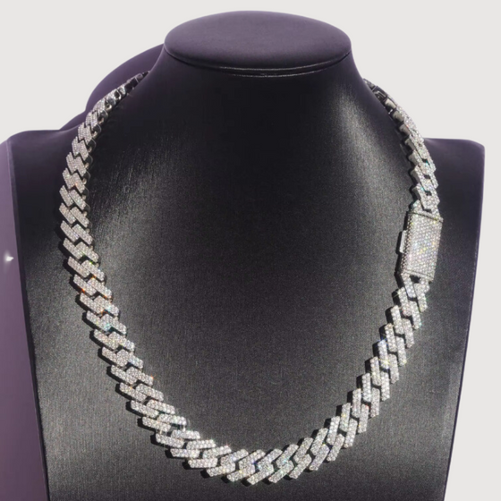 Shop 15mm Iced-Out Cuban Link Chain. Featuring 2-Row certified Moissanite Diamond Stimulants crafted in 925 Sterling Silver. 