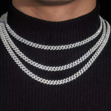  Shop 6mm Iced-Out Cuban Link Chain. Featuring Certified Moissanite Diamond Stimulants set in Premium 925 Sterling Silver and Rhodium Plated. 