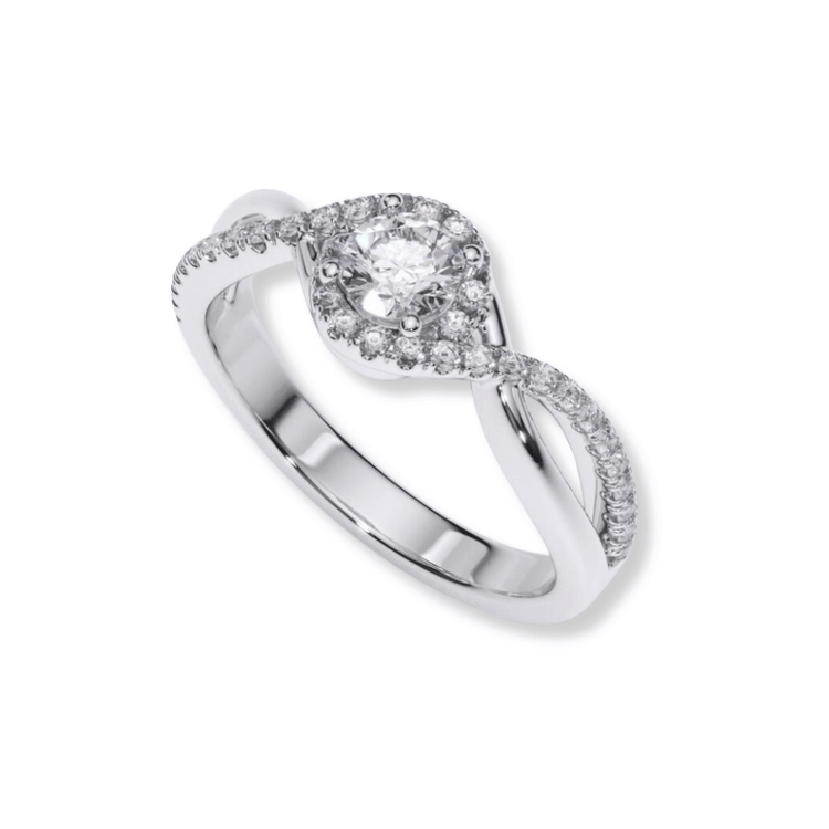 The Infinity Halo Lab Diamond Engagement Ring is a silver ring showcasing a round lab diamond, encircled by an infinity halo of smaller diamonds and a twisting band accented with sparkling stones.