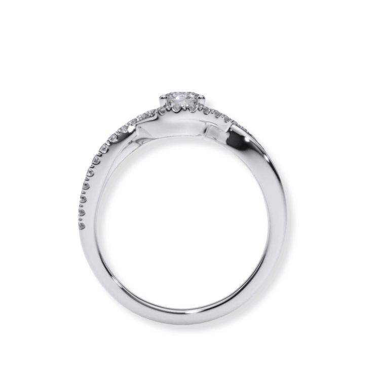 The Infinity Halo Lab Diamond Engagement Ring features a silver band with a prong-set round lab diamond center and small diamonds along the top half, shown from the side.