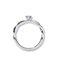 The Infinity Twist Lab Grown Diamond Solitaire Engagement Ring features a silver twisted band and a single round lab diamond at the top, shown from the side against a white background.