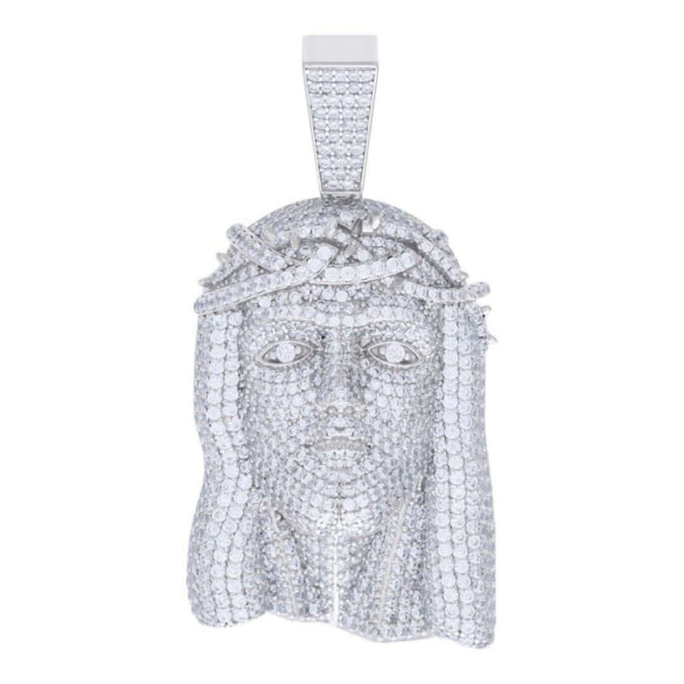 The Moissanite Jesus Religious Charm Pendant features a detailed face with a crown of thorns and sparkling white stones. Its rectangular bail allows easy attachment to a chain, blending elegance with spiritual meaning.