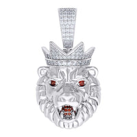 The King Lion Head Charm Pendant - Silver Moissanite features a bold 925 sterling silver lion head with a jeweled crown, VVS moissanite accents, clear sparkling stones, and vivid red gemstone eyes and mouth.