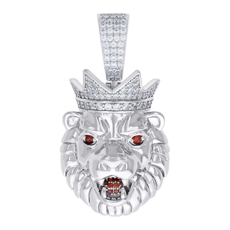 The King Lion Head Charm Pendant - Silver Moissanite features a bold 925 sterling silver lion head with a jeweled crown, VVS moissanite accents, clear sparkling stones, and vivid red gemstone eyes and mouth.