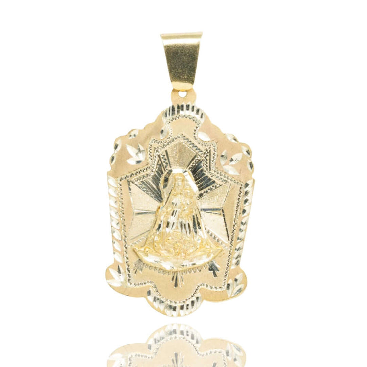 The Lady Charity Caridad del Cobre Pendant in 10k solid gold features an embossed Virgin Mary with ornate engraved patterns and scalloped edges, plus a polished bail—an elegant choice for any men’s gold jewelry collection.